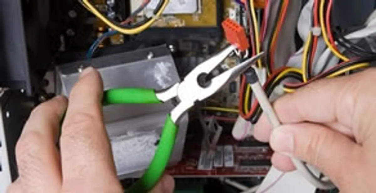 Licensed electrical contractor performing electrical repair with tools in Bella Vista, CA